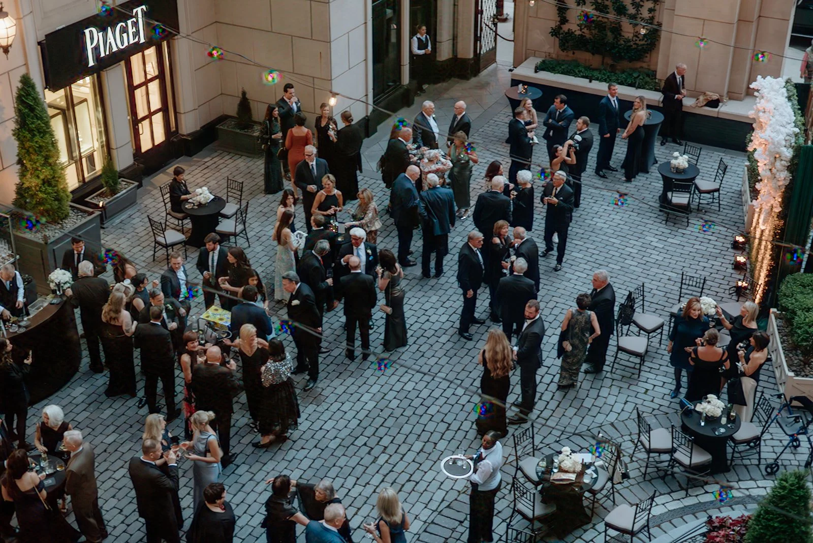 Cocktail hour in the Waldorf Astoria Chicago courtyard for Gianna and Austin