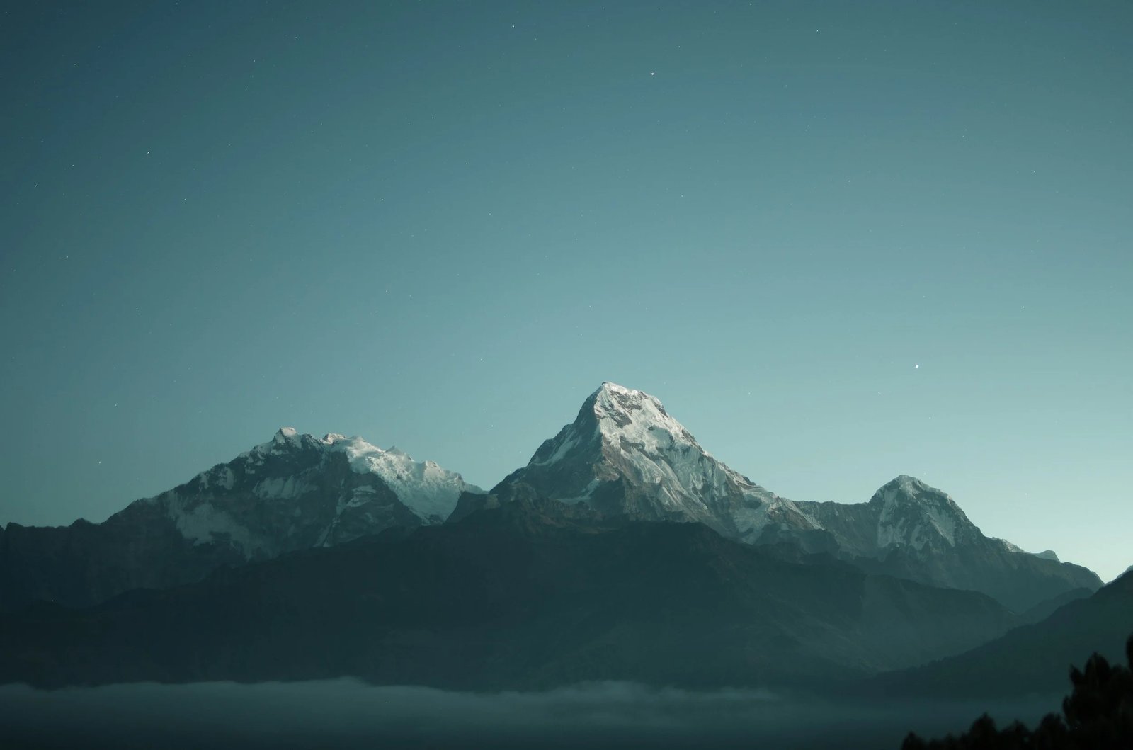 A calm mountain landscape at first light